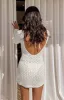Alessia White Crochet Knit Long Sleeve Mini Dress sold by Beginning Boutique