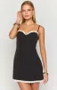 Seaton Black Polka Dot Mini Dress sold by Beginning Boutique