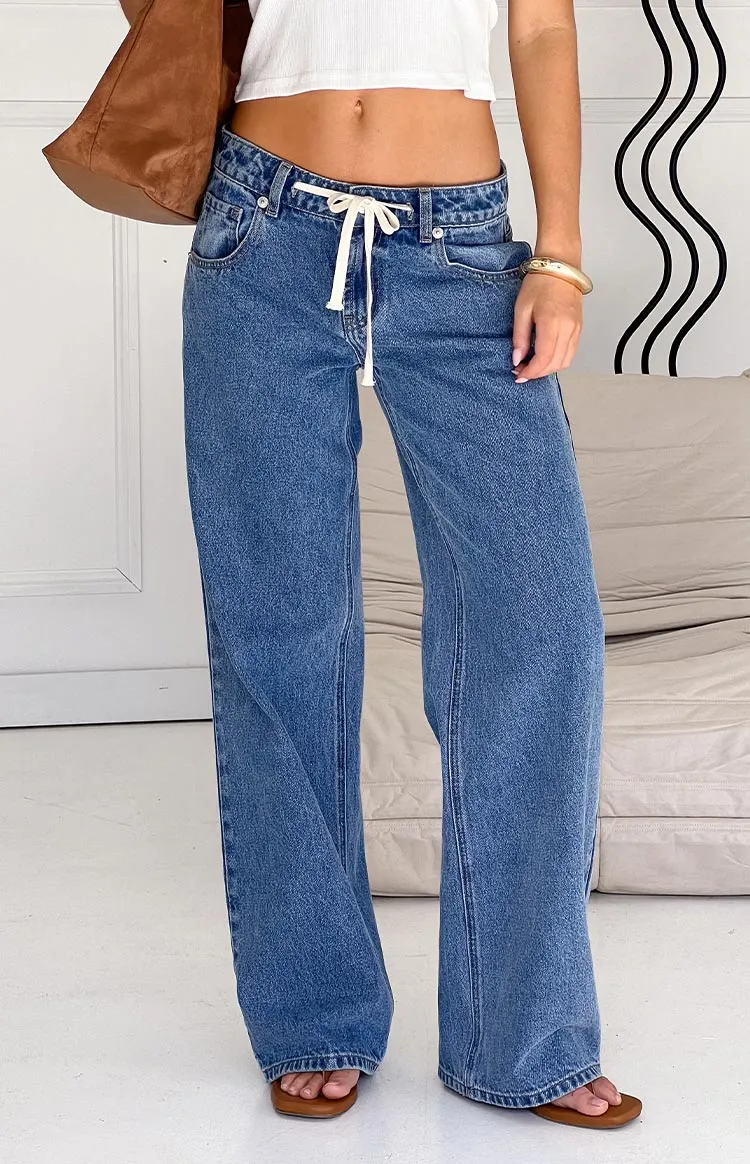 Beau Mid Wash Tie Waist Denim Jeans sold by Beginning Boutique