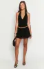 Clancy Black Velvet Mini Skirt sold by Beginning Boutique