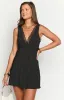 Oblivion Black Polka Dot Mini Dress sold by Beginning Boutique