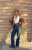 All I Wanted Brown Plaid Puffer Jacket sold by Beginning Boutique