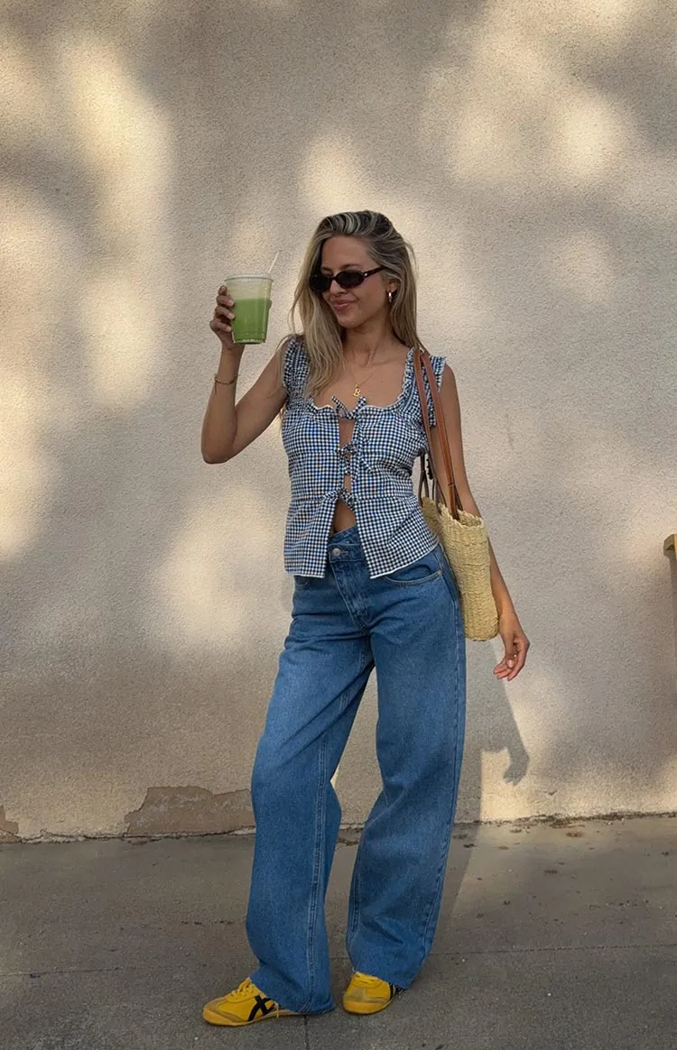 Kansis Mid Wash Scallop Pockets Uneven Waist Jeans sold by Beginning Boutique