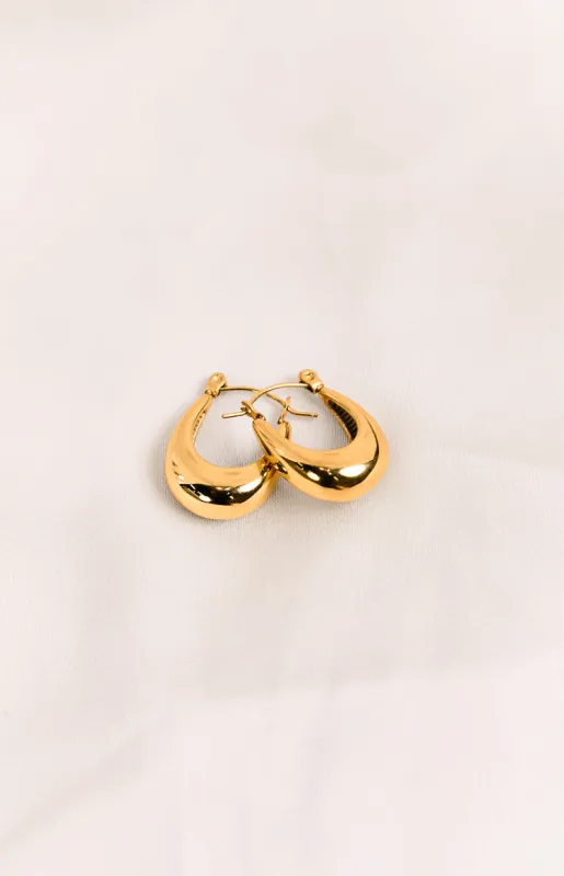 Lucetta Gold Oval Statement Hoop Earrings sold by Beginning Boutique