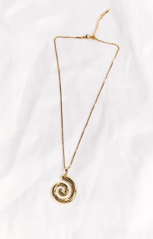 Caledonia Gold Swirl Necklace sold by Beginning Boutique