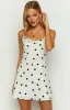 Aura Cowl Neck Polka Dot Mini Dress sold by Beginning Boutique