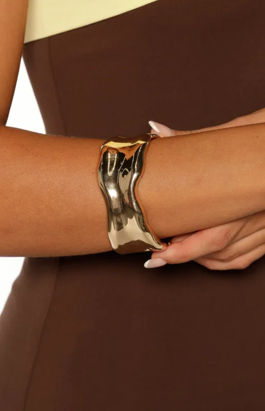 Auren Gold Wavy Clasp Bangle sold by Beginning Boutique
