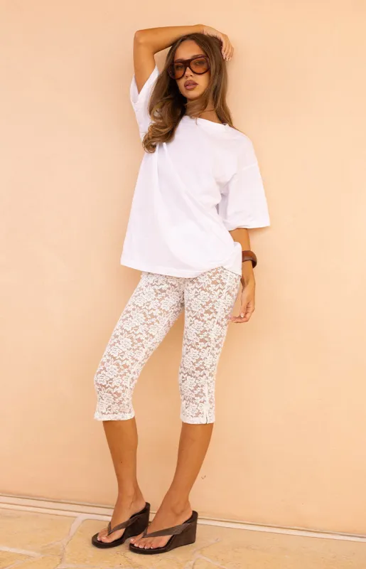 Lydia White Lace Mid Rise Capri Pants sold by Beginning Boutique