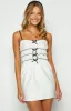 It Girl White Bow Mini Dress sold by Beginning Boutique