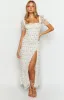Clydie White Floral Cap Sleeve Midi Dress sold by Beginning Boutique