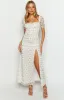 Clydie White Floral Cap Sleeve Midi Dress sold by Beginning Boutique
