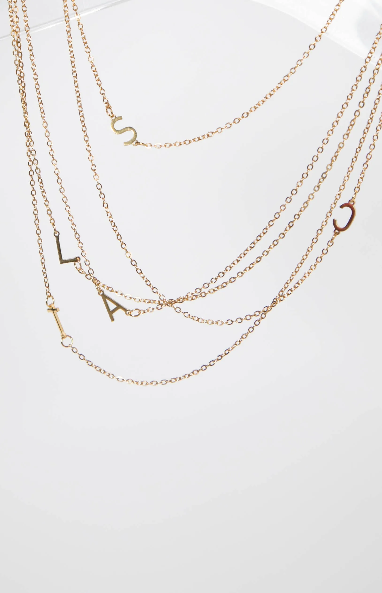 Icy Elegance Gold Stainless Steel Initial Necklace sold by Beginning Boutique product image thumbnail 3