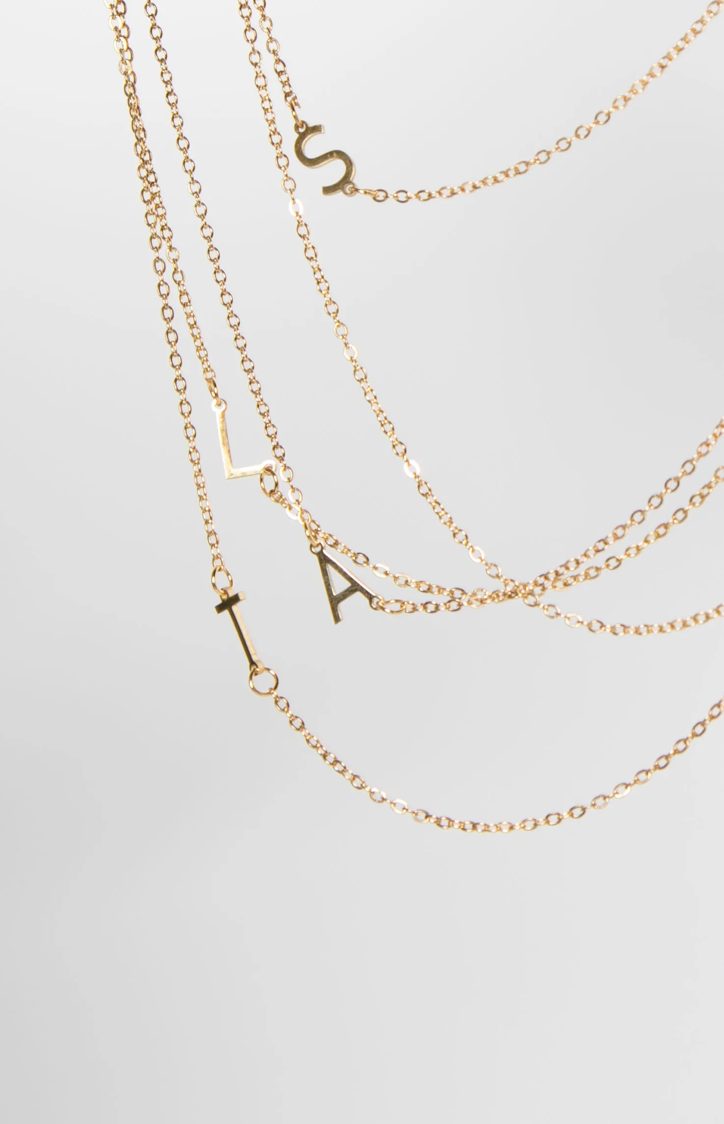 Icy Elegance Gold Stainless Steel Initial Necklace sold by Beginning Boutique product image thumbnail 4