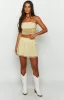 Stay Yellow Strapless Mesh Corset Top sold by Beginning Boutique