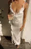 Nahanee Cream Satin Ruffle Maxi Dress sold by Beginning Boutique