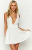 Genovia White Sparkle Mini Dress sold by Beginning Boutique