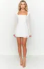 Lucy White Long Sleeve Mini Dress sold by Beginning Boutique