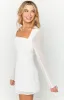 Lucy White Long Sleeve Mini Dress sold by Beginning Boutique