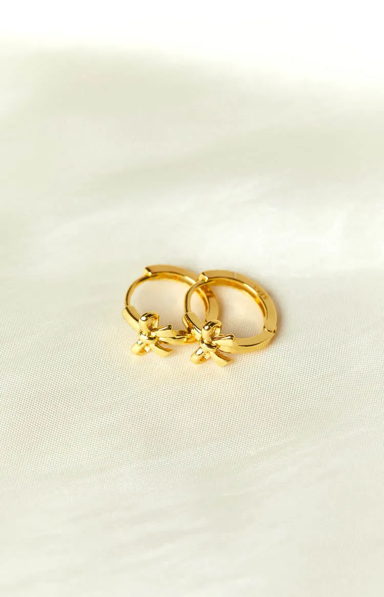 Darling Gold Bow Huggie Earrings sold by Beginning Boutique product image thumbnail 2