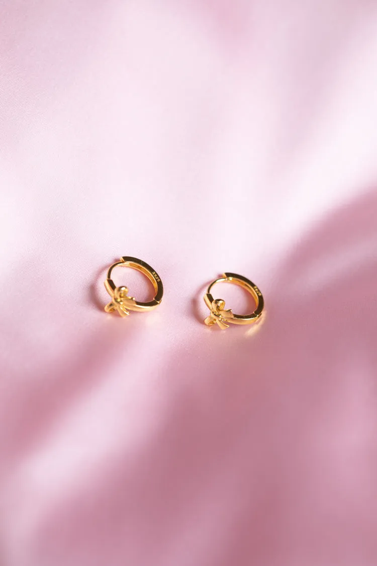 Darling Gold Bow Huggie Earrings sold by Beginning Boutique product image thumbnail 4