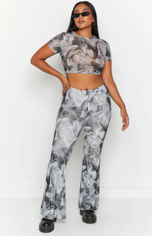 Willow Black Print Mesh Flare Pants sold by Beginning Boutique