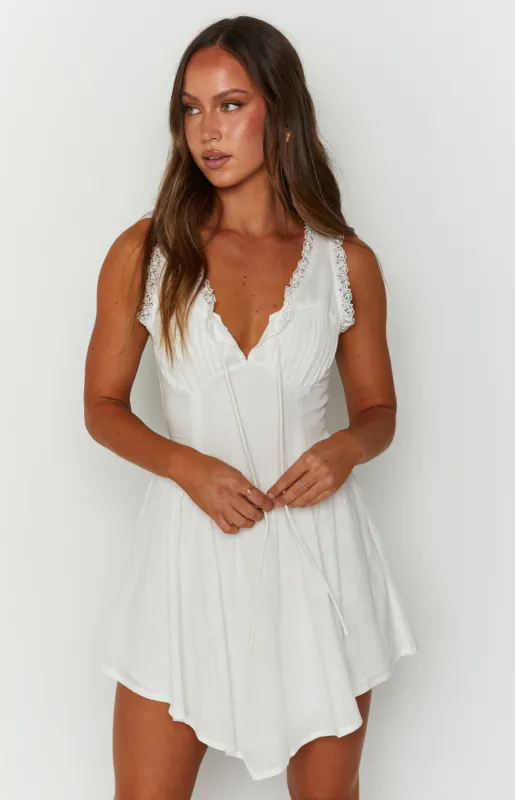 Posey White Frill Mini Dress sold by Beginning Boutique