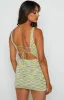 Georgie Yellow Lace Up Mini Dress sold by Beginning Boutique