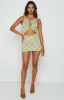 Georgie Yellow Lace Up Mini Dress sold by Beginning Boutique
