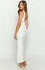Vira White Maxi Dress sold by Beginning Boutique