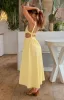 Kensington Yellow Backless Midi Dress sold by Beginning Boutique
