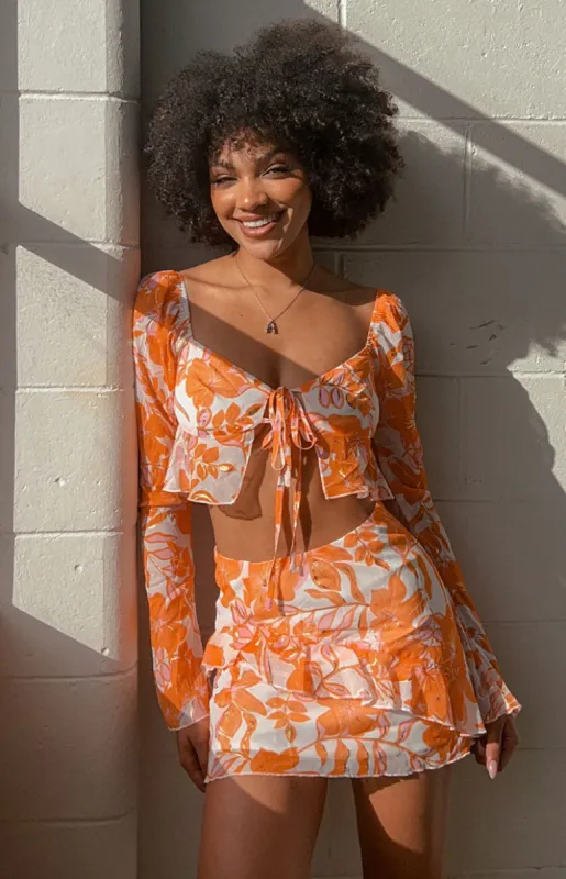 Jayella Orange Floral Mini Skirt sold by Beginning Boutique