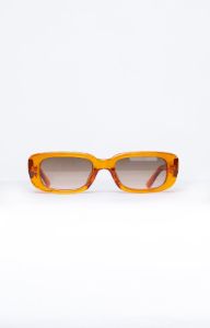 Go To Vintage Transparent Orange Sunglasses sold by Beginning Boutique