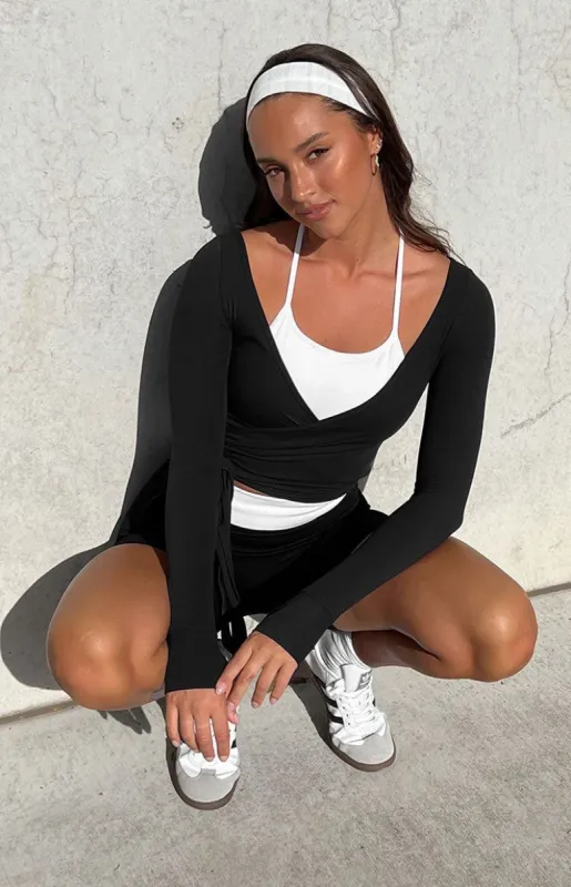Jeanne The Label Black Wrap Top sold by Beginning Boutique