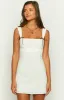Taylor White Tie Back Mini Dress sold by Beginning Boutique