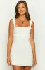 Taylor White Tie Back Mini Dress sold by Beginning Boutique