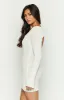 Grace White Mini Dress sold by Beginning Boutique