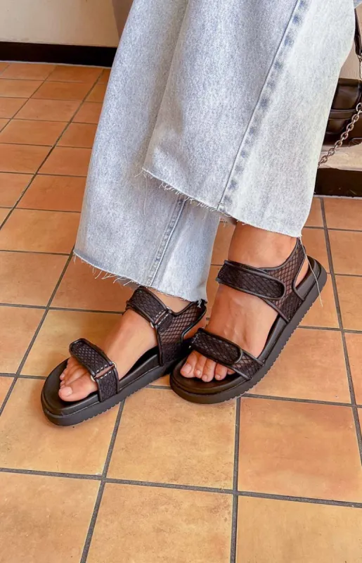 Therapy Rhode Black PU Sandals sold by Beginning Boutique