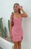 Rihanna Red Check Mini Dress sold by Beginning Boutique