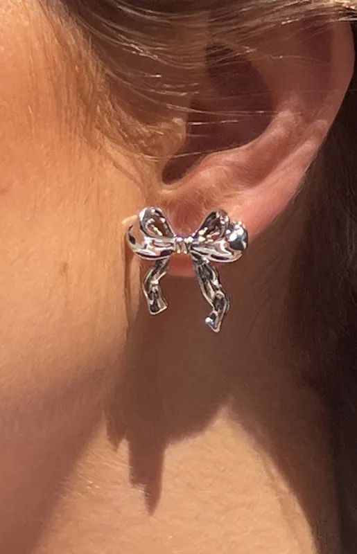 Calista Silver Bow Earrings sold by Beginning Boutique