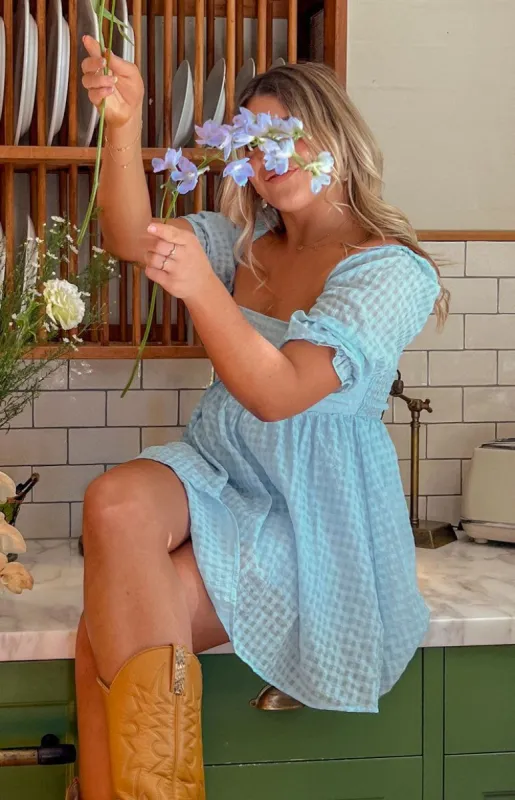 Rubi Blue Babydoll Mini Dress sold by Beginning Boutique