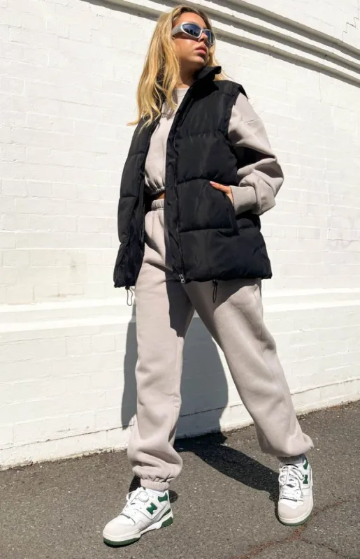 Nalia Black Puffer Vest sold by Beginning Boutique