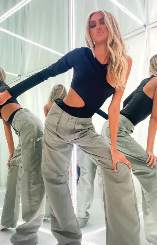 Lillian Black Cut Out Bodysuit sold by Beginning Boutique