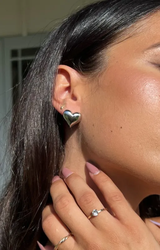 Heartbroken Silver Heart Earrings sold by Beginning Boutique