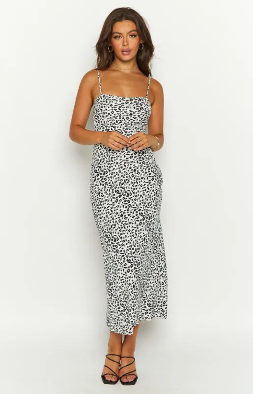 Delphine Black Floral Midi Dress sold by Beginning Boutique
