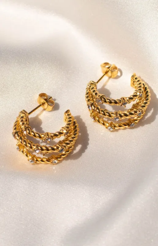 Ariel Gold Claw Hoop Earrings sold by Beginning Boutique