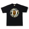 Bape 1st Camo Busy Works Tee Black/Yellow (SS21) sold by PLUS