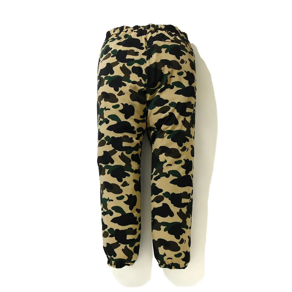 BAPE 1ST CAMO STRETCH TRACK PANTS sold by PLUS