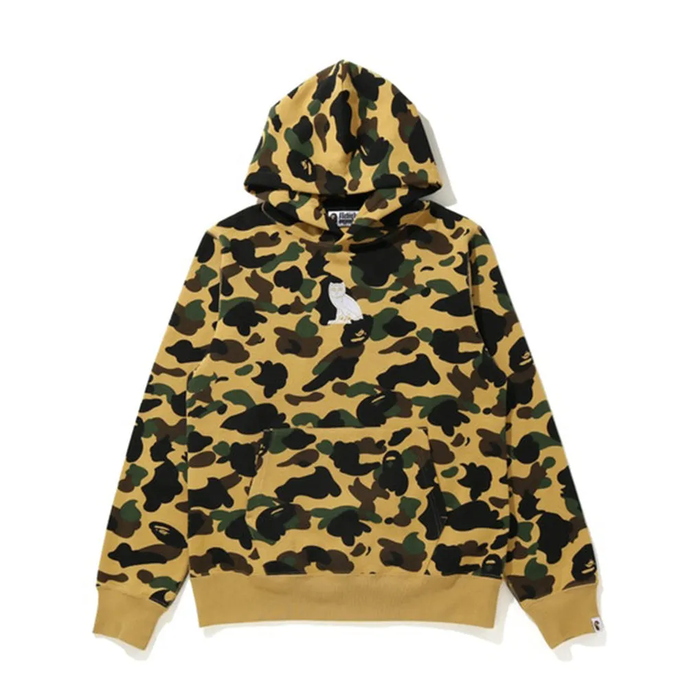 BAPE x OVO 1st Camo Pullover Hoodie Yellow sold by PLUS