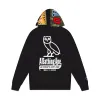 OVO x BAPE Camo Shark Reversible Full-Zip Hoodie Black sold by PLUS