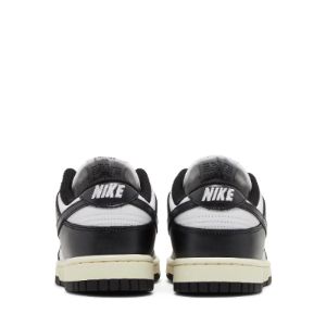 Nike Dunk Low Vintage Panda (W) sold by PLUS